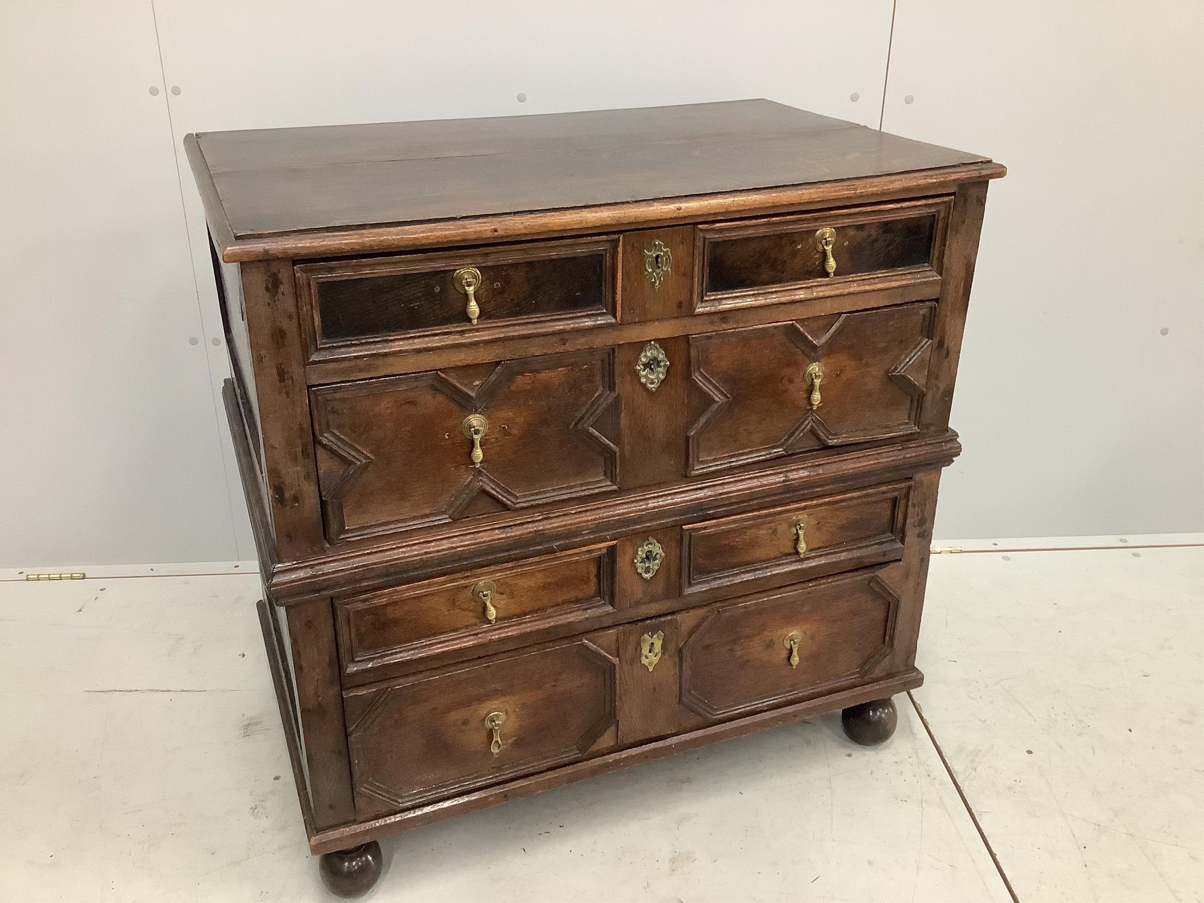 An early 18th century oak chest, width 92cm, depth 56cm, height 90cm. Condition - fair